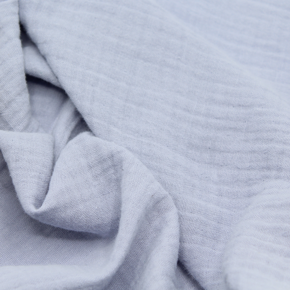 Double gaze de coton BIO unie bleu pastel poudré