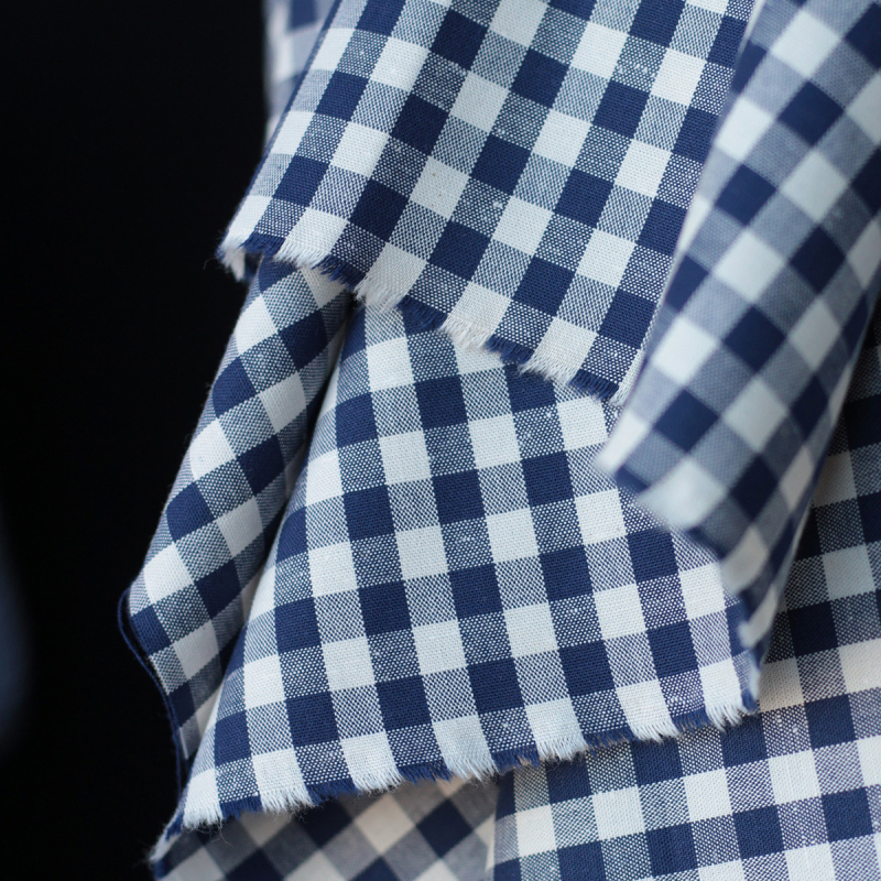 Coton chiné aspect brut vichy moyennes 7mm coloris bleu marine