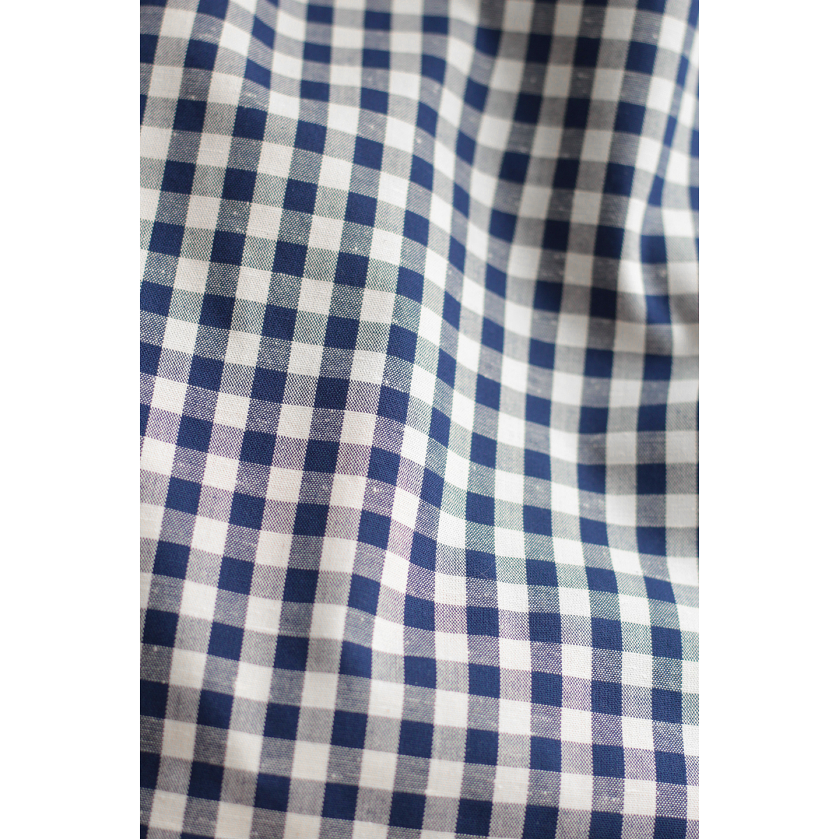 Coton chiné aspect brut vichy moyennes 7mm coloris bleu marine