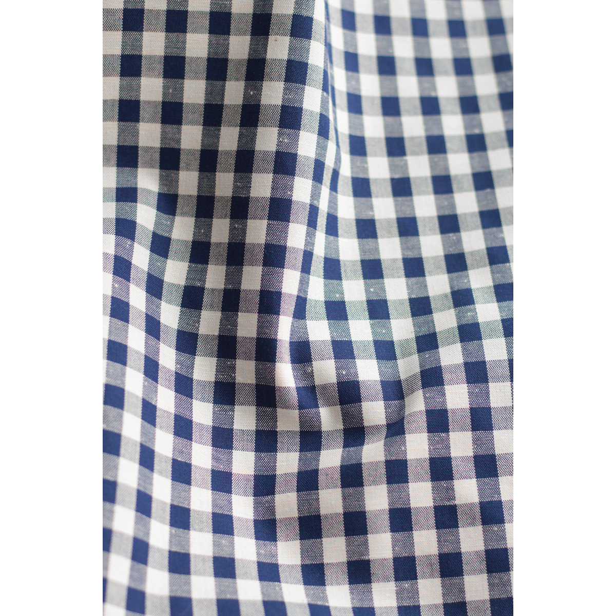 Coton chiné aspect brut vichy moyennes 7mm coloris bleu marine