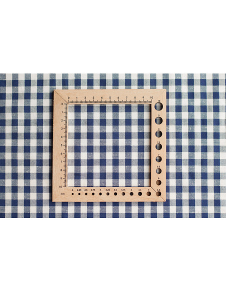 Coton chiné aspect brut vichy moyennes 7mm coloris bleu marine