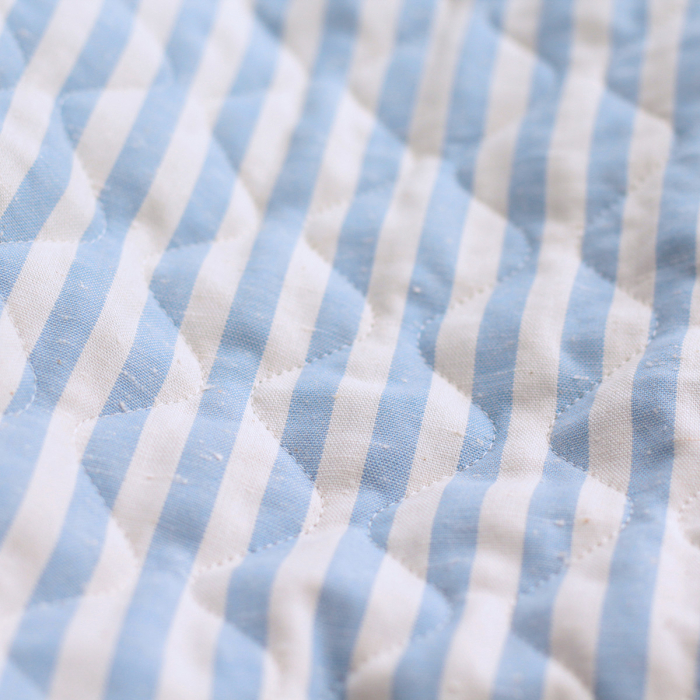 copy of Tissu matelassé coton chiné à rayures bleu marine / écru