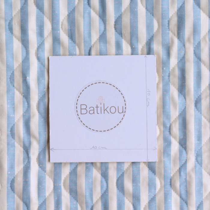 copy of Tissu matelassé coton chiné à rayures bleu marine / écru