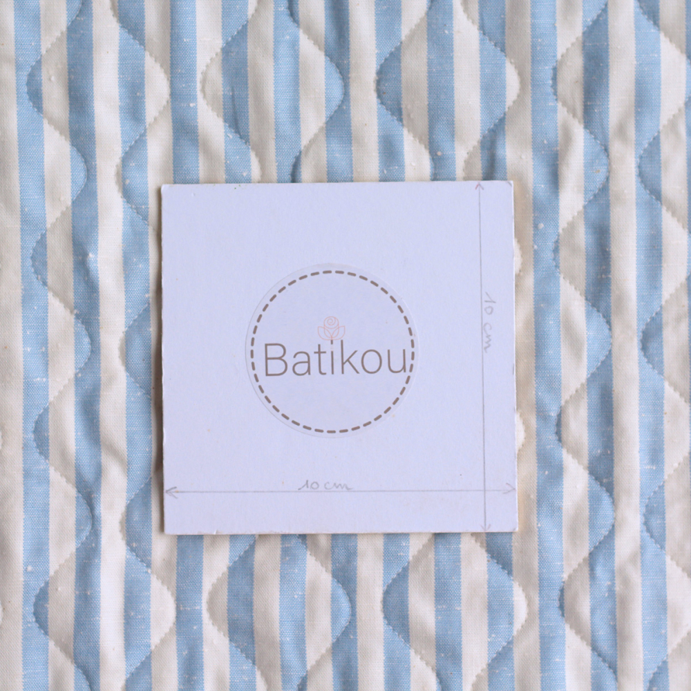 copy of Tissu matelassé coton chiné à rayures bleu marine / écru