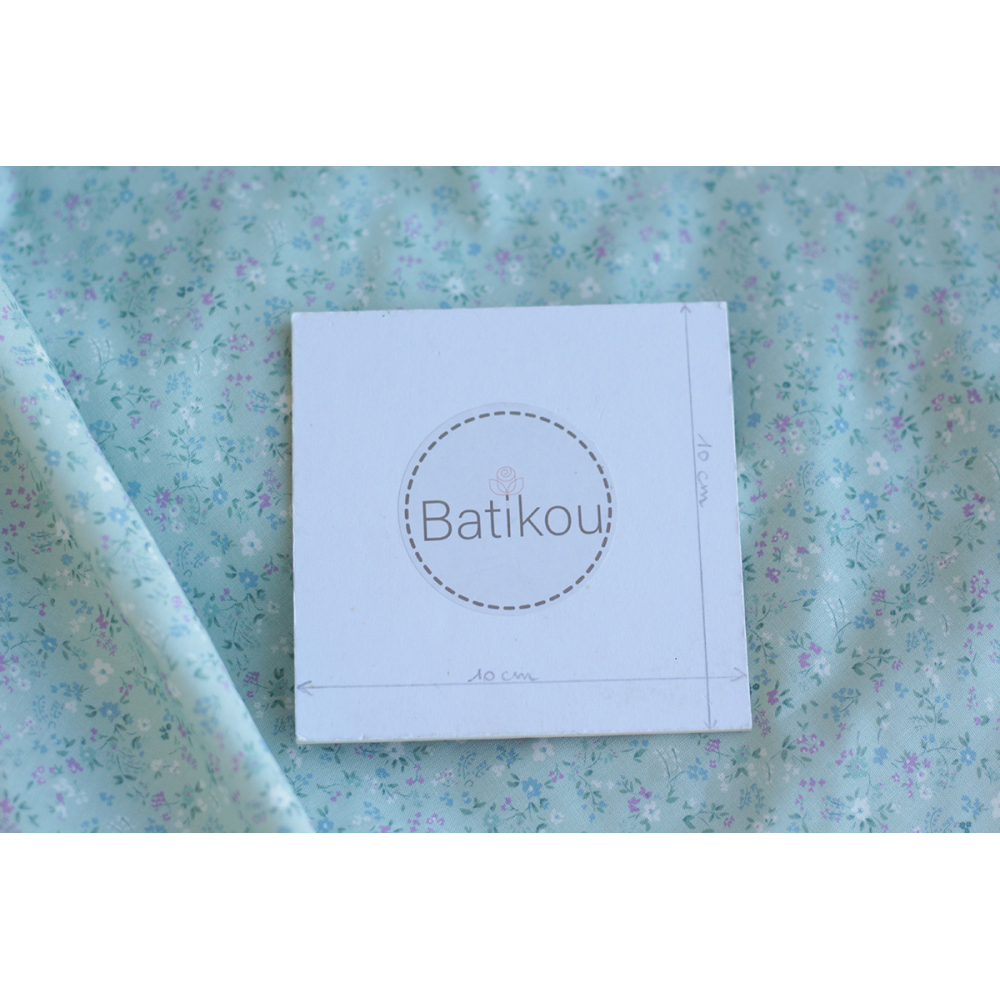 Ingrid - Popeline de coton BIO imprimé fleuri fond celadon