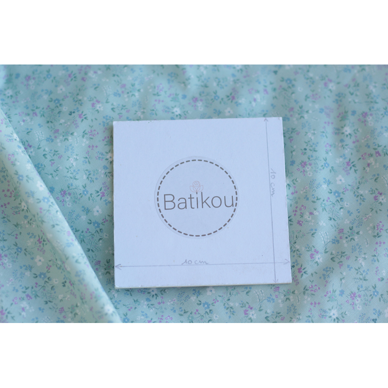 Ingrid - Popeline de coton BIO imprimé fleuri fond celadon