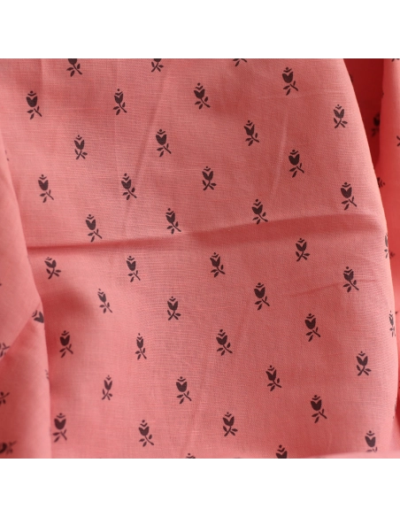 Lola - Tissu lin coton fond corail clair petits motifs noirs