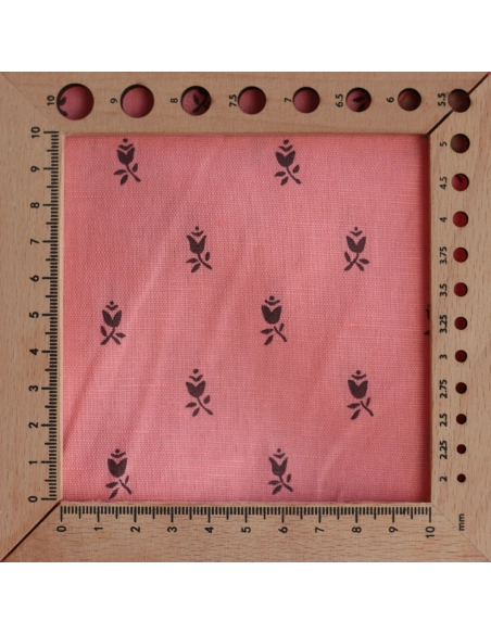 Lola - Tissu lin coton fond corail clair petits motifs noirs