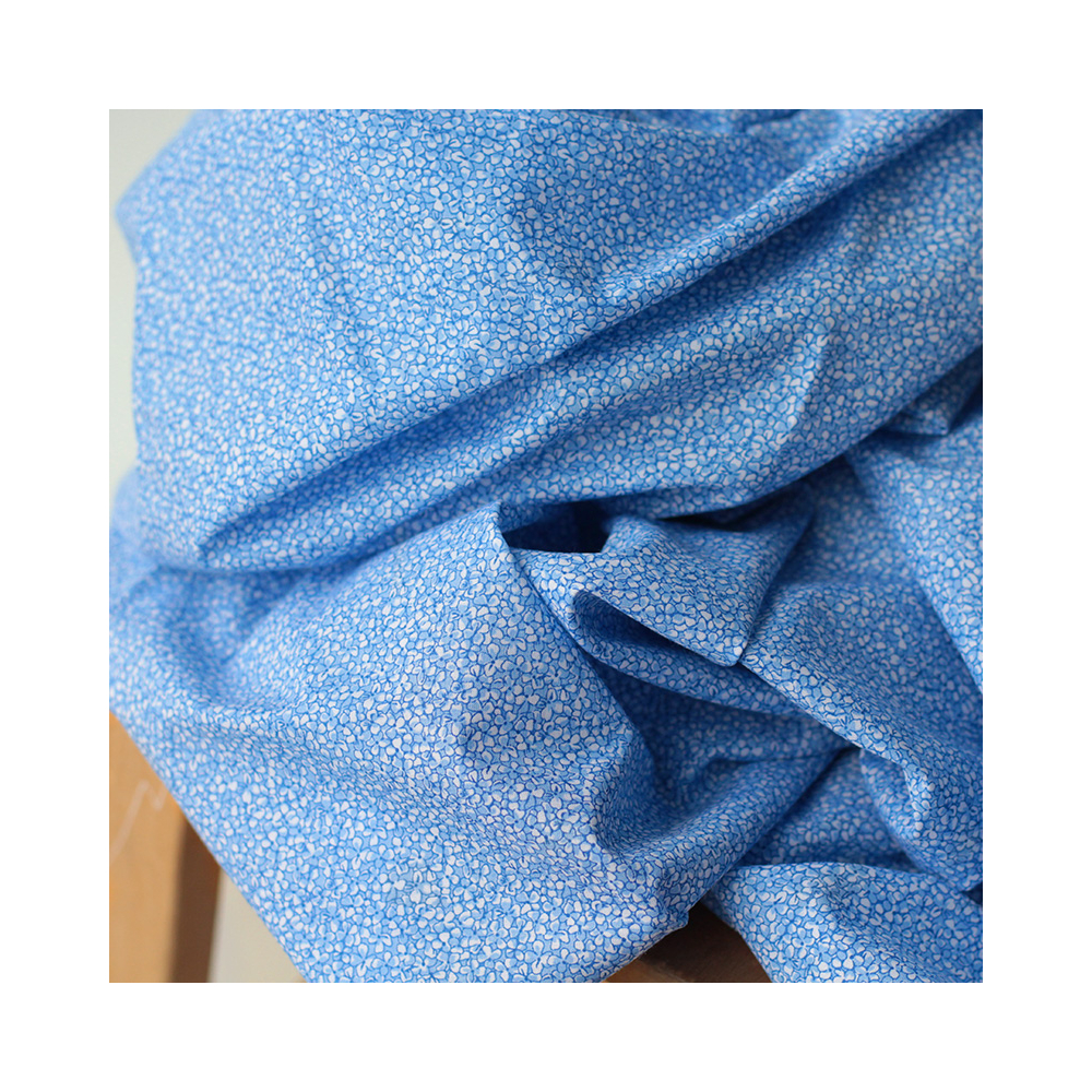 Jane - Batiste de coton SILKYNE à imprimé fleuri bleu Jane - Batiste de coton SILKYNE à imprimé fleuri bleu