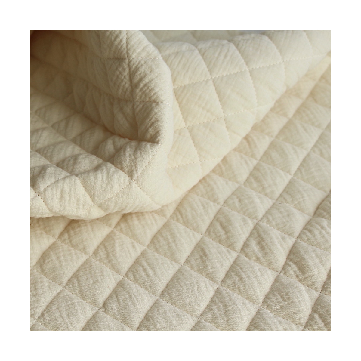 Tissu matelassé double gaze coton uni écru Tissu matelassé double gaze coton uni écru