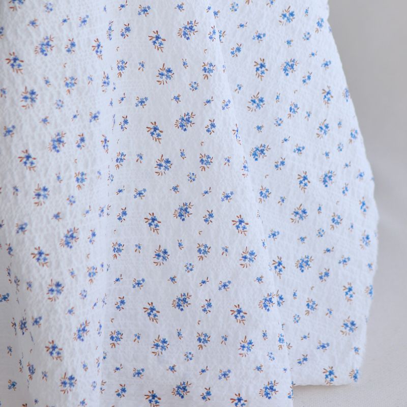 copy of Paulette - Tissu coton texturé gaufré fleuri rouge et vert