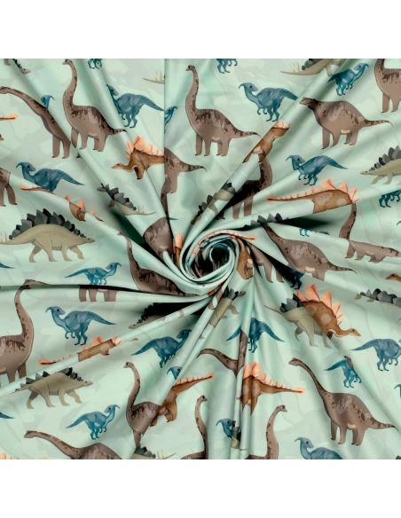 Tissu Lycra (maillot de bain) UPF50 dinosaures sur fond vert clair