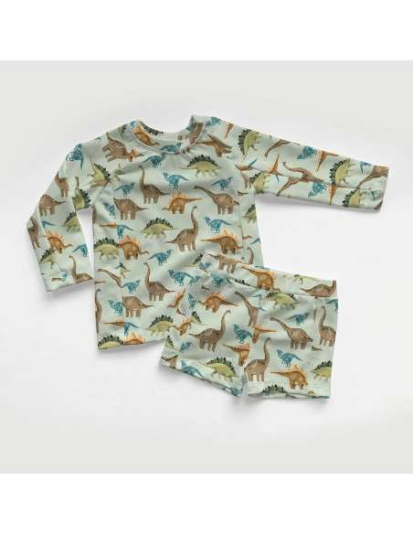Tissu Lycra (maillot de bain) UPF50 dinosaures sur fond vert clair