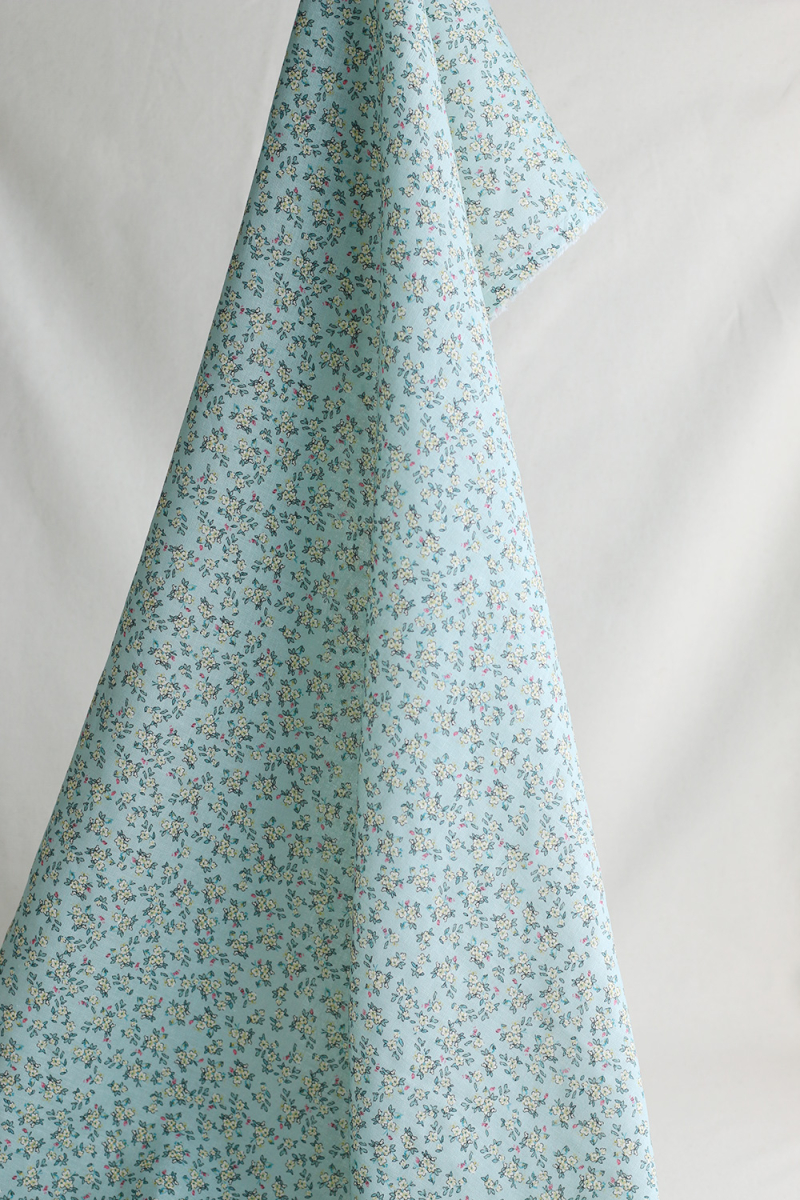 Lin et coton fond jade motif petit fleuri