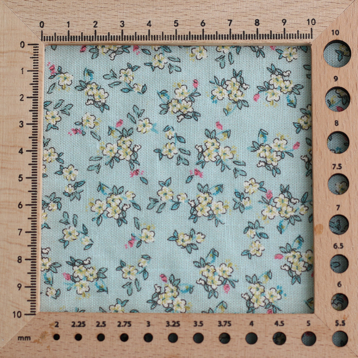 Lin et coton fond jade motif petit fleuri