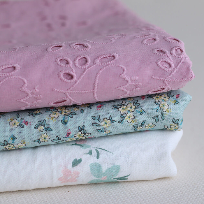 Lin et coton fond jade motif petit fleuri