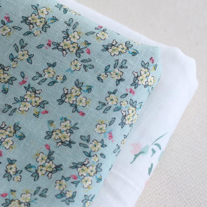 Lin et coton fond jade motif petit fleuri