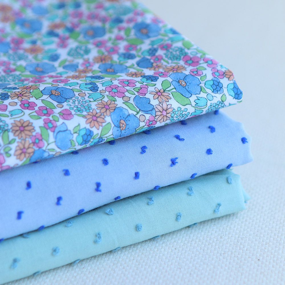 Plumetis de coton bicolore bleu ciel / bleu roi