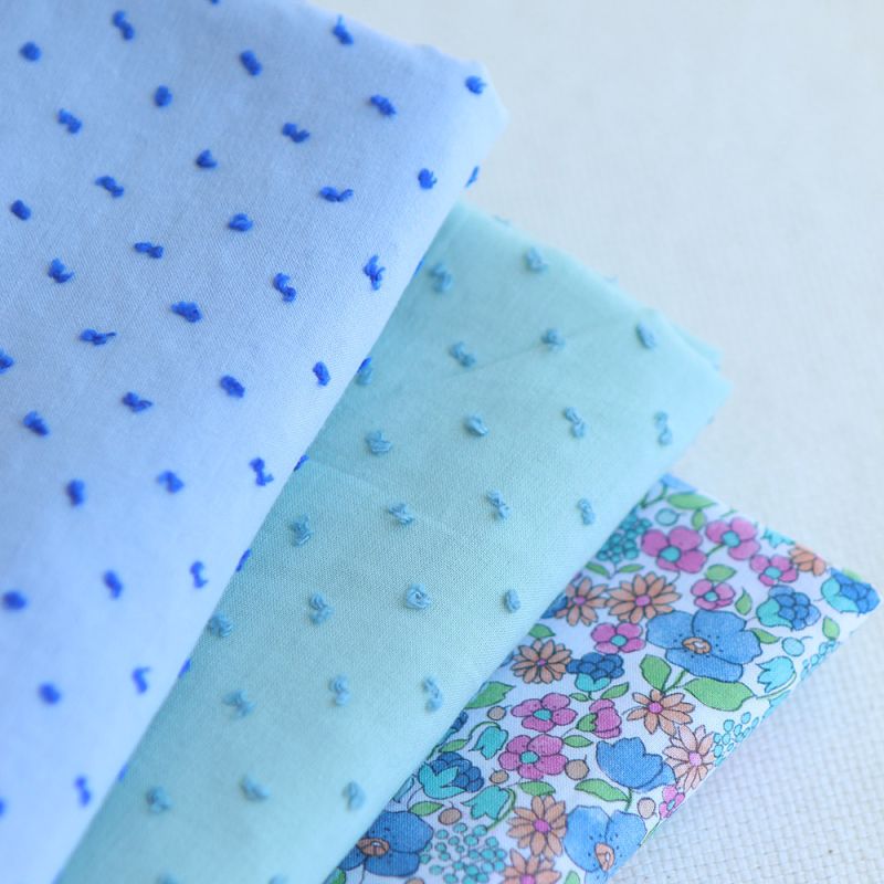 Plumetis de coton bicolore bleu ciel / bleu roi