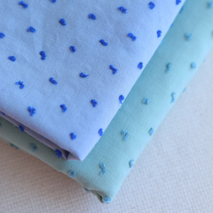 Plumetis de coton bicolore bleu ciel / bleu roi