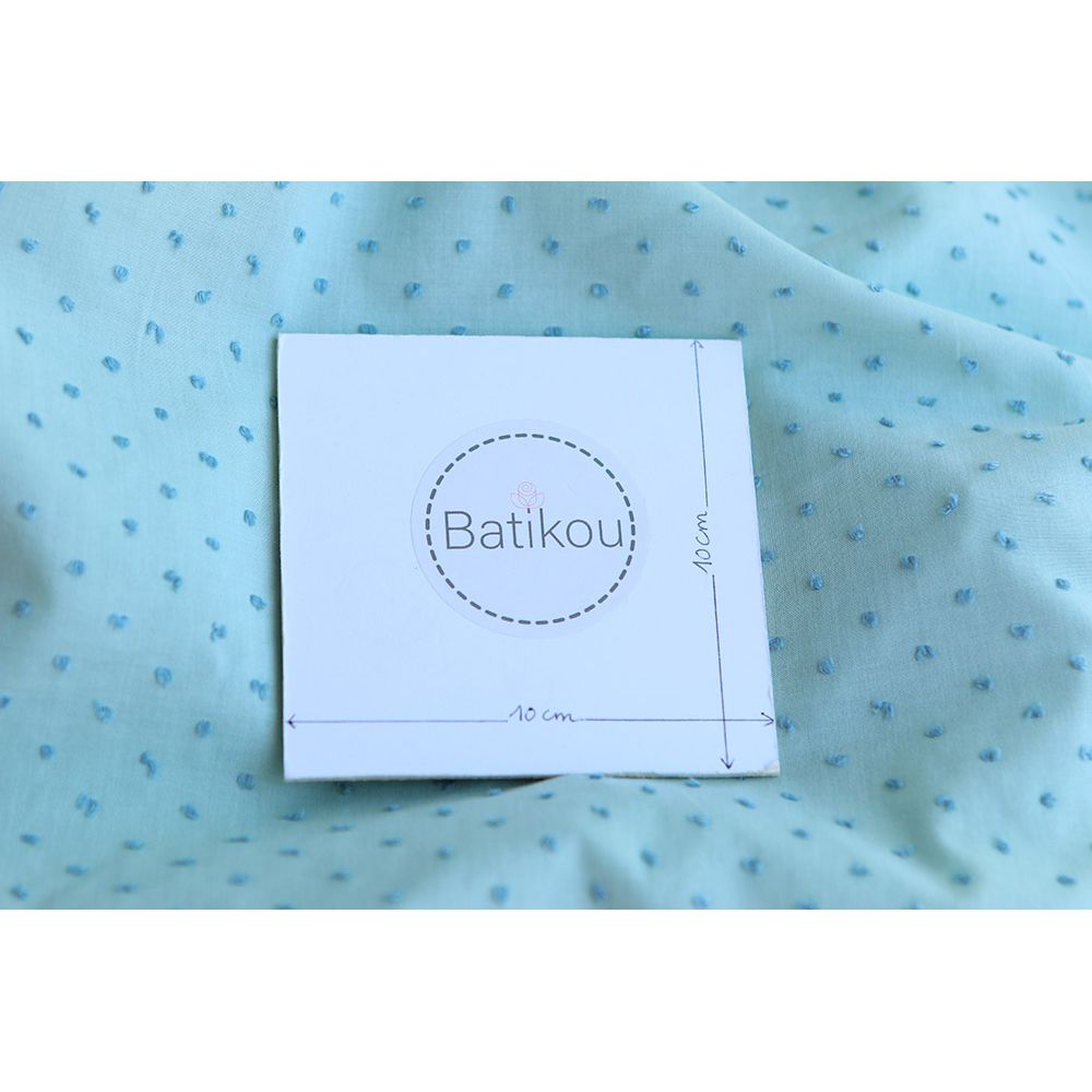 Plumetis de coton bicolore vert d'eau