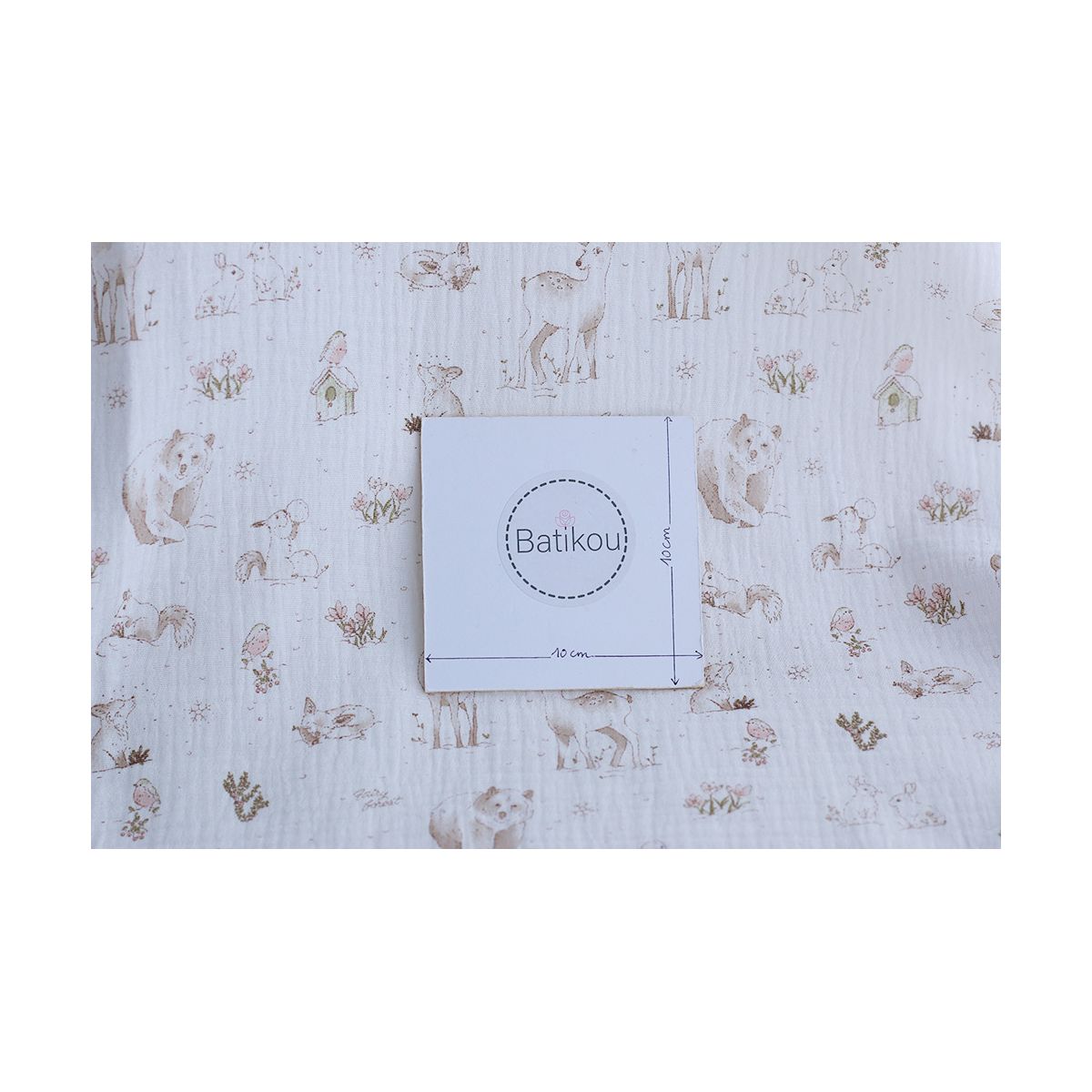 Robin - Double gaze de coton motif forêt tons beige Robin - Double gaze de coton motif forêt tons beige