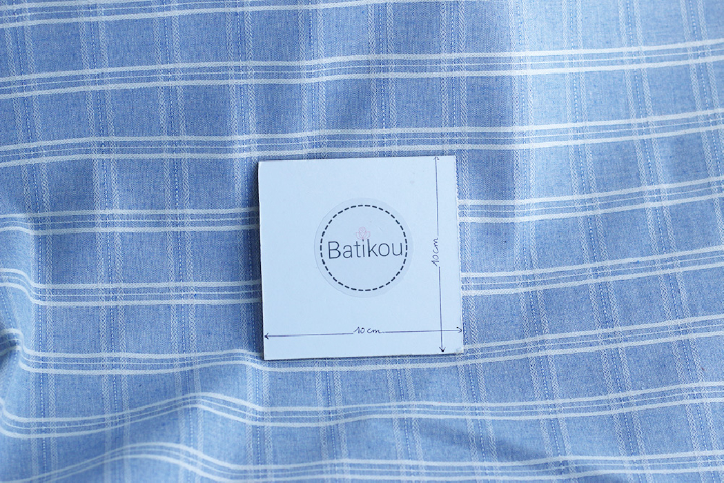 Tissu coton et viscose texturé quadrillage blanc et bleu nuage