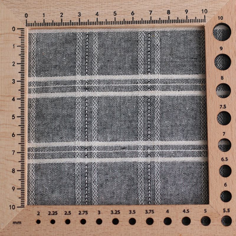 Tissu coton et viscose texturé quadrillage blanc et noir