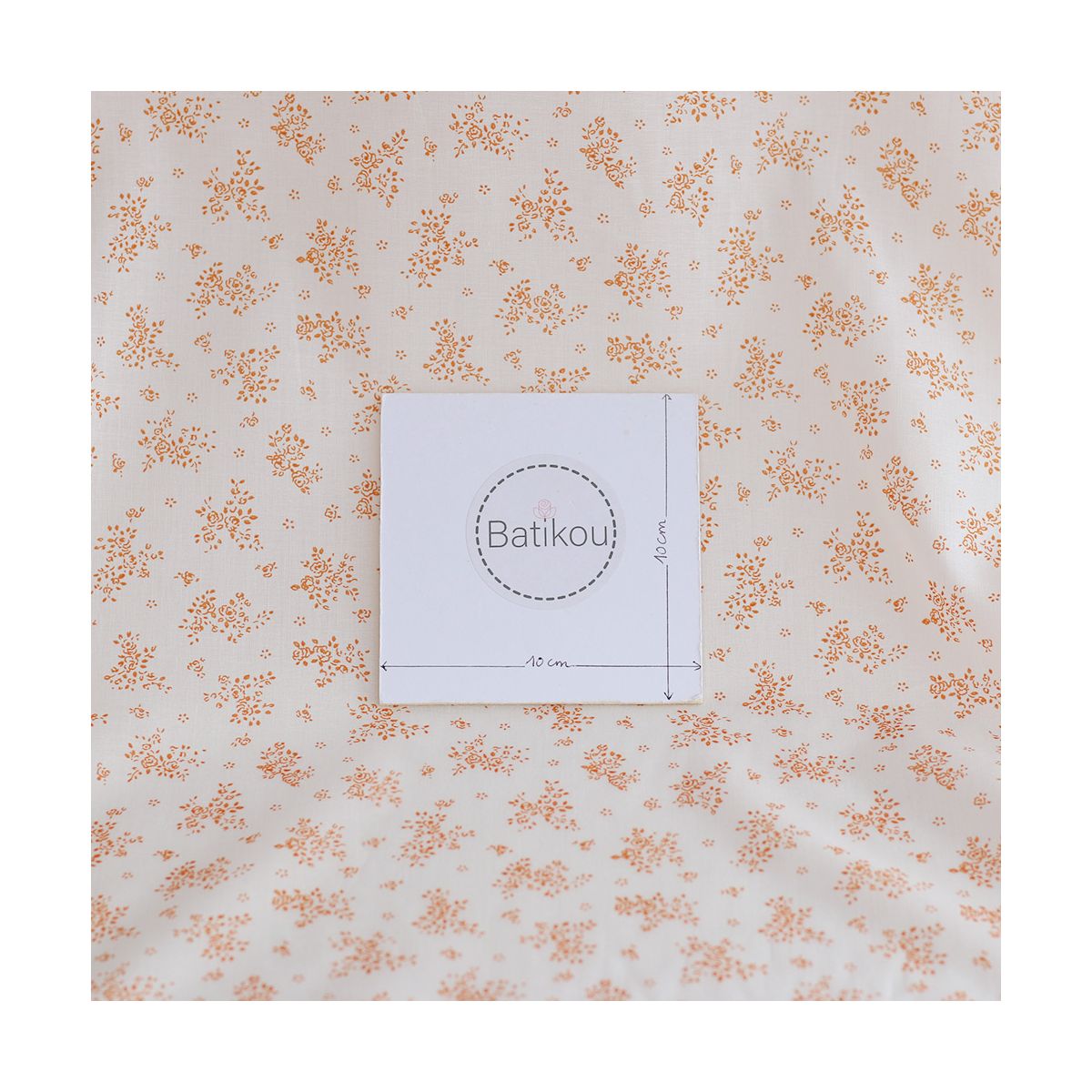 Renée - Batiste de coton douce à imprimé fleuri orange Renée - Batiste de coton douce à imprimé fleuri orange