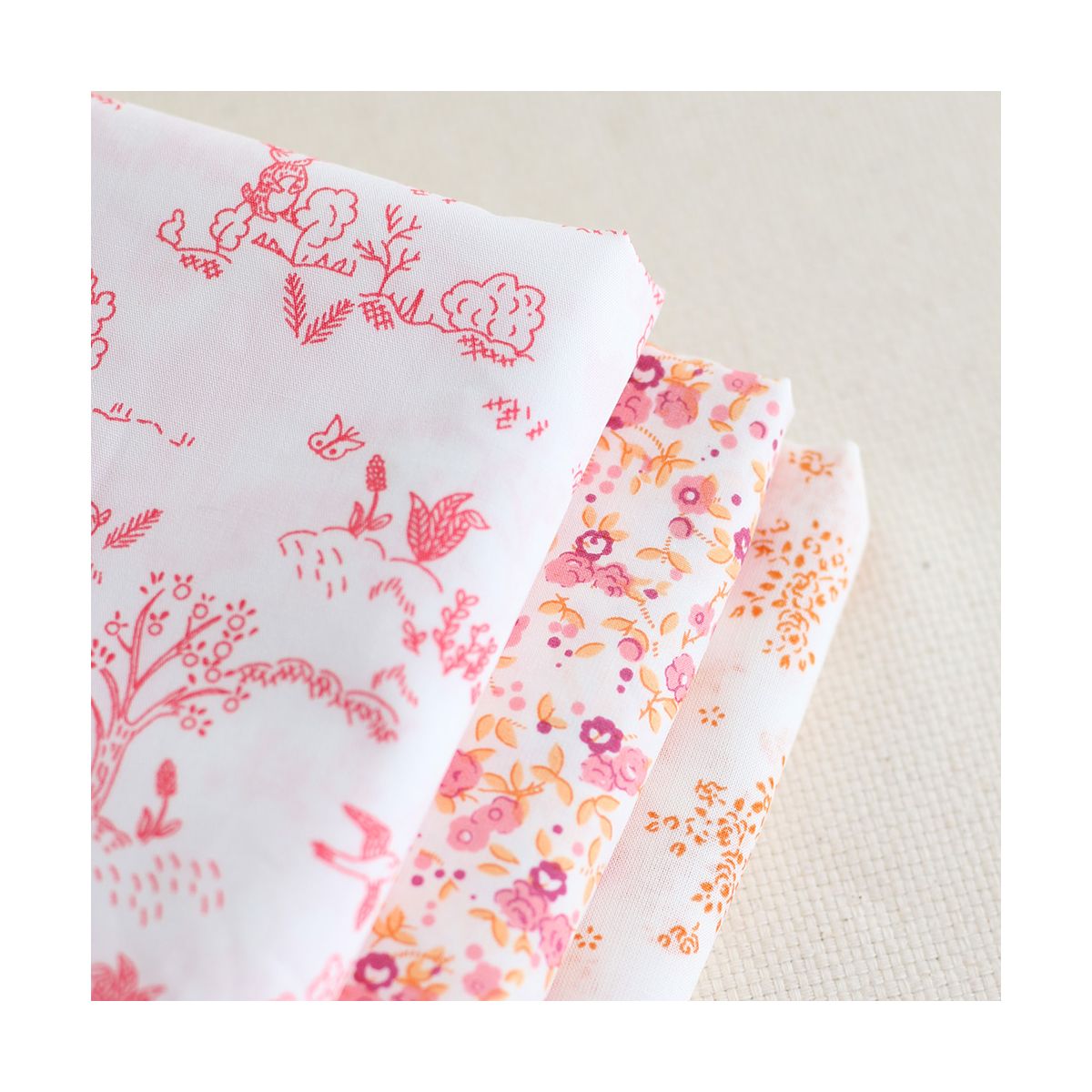 Renée - Batiste de coton douce à imprimé fleuri orange Renée - Batiste de coton douce à imprimé fleuri orange