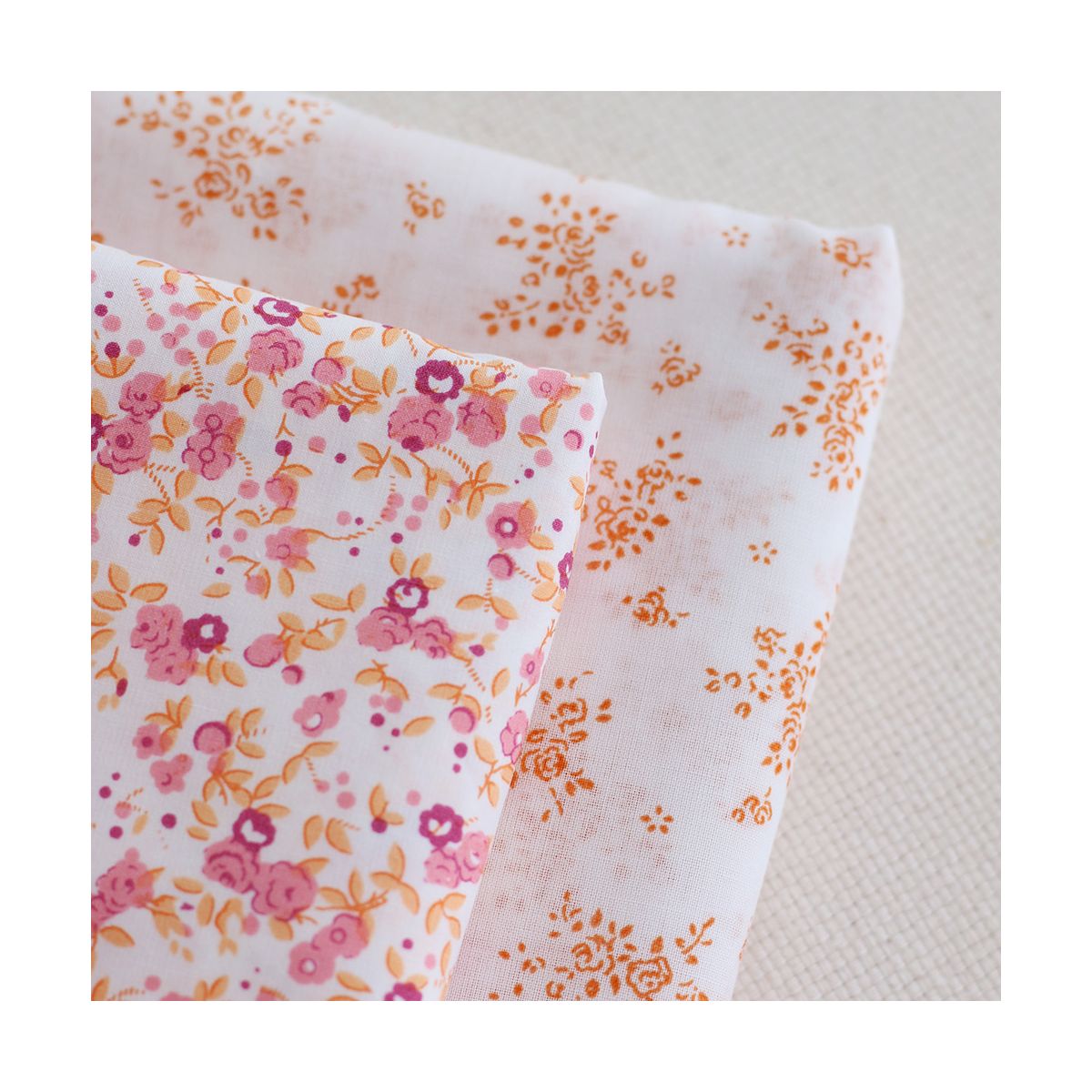 Renée - Batiste de coton douce à imprimé fleuri orange Renée - Batiste de coton douce à imprimé fleuri orange