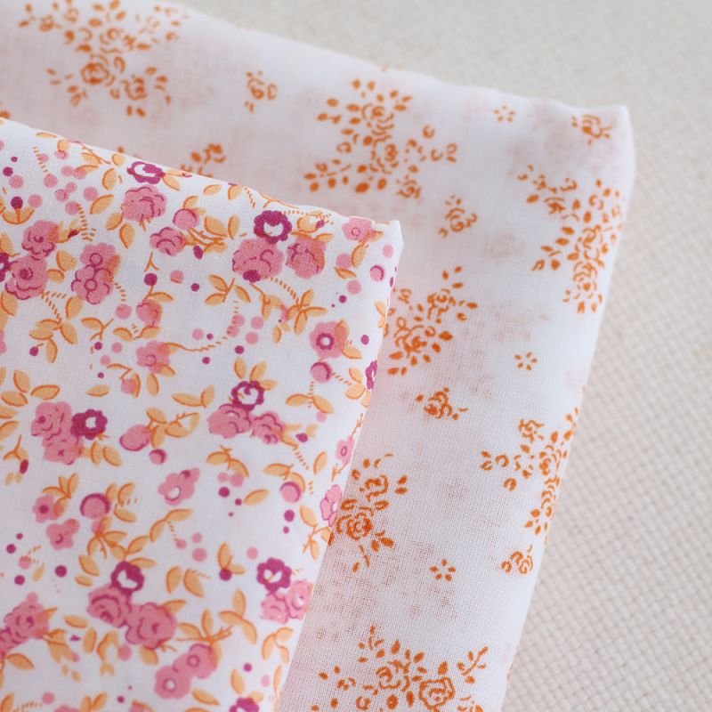 Renée - Batiste de coton douce à imprimé fleuri orange