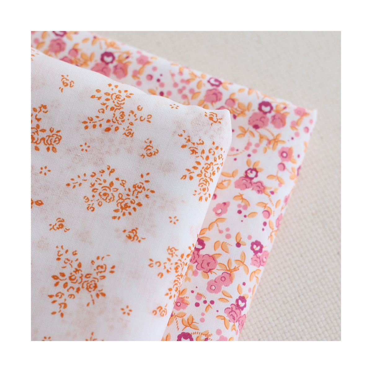Renée - Batiste de coton douce à imprimé fleuri orange Renée - Batiste de coton douce à imprimé fleuri orange