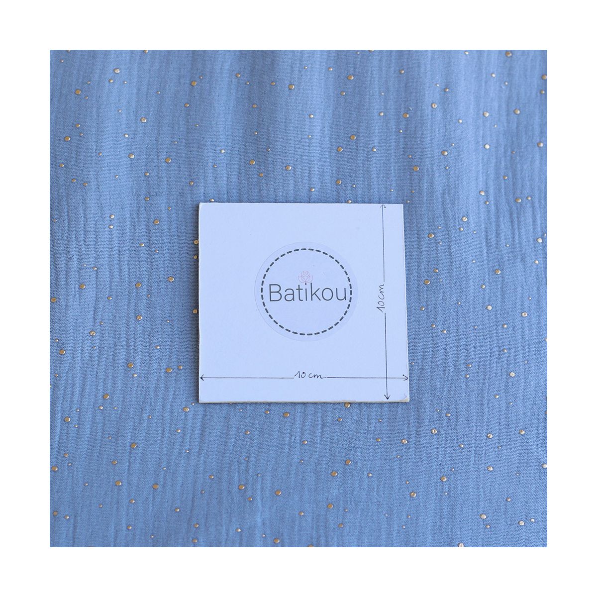 Double gaze de coton pois dorés fond bleu nuage Double gaze de coton pois dorés fond bleu nuage