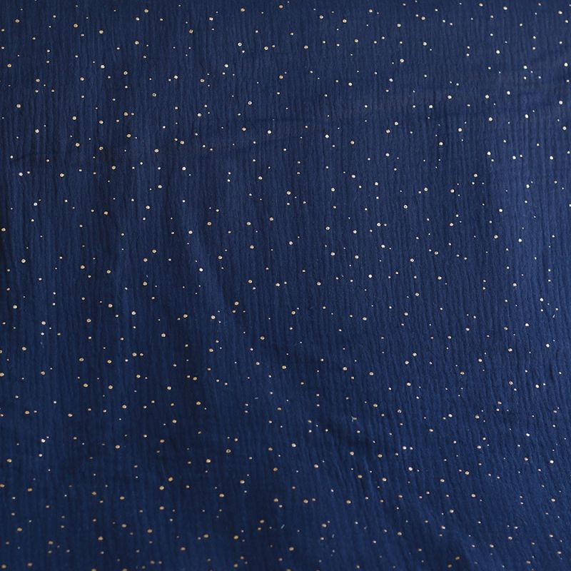 Double gaze de coton pois dorés fond bleu marine
