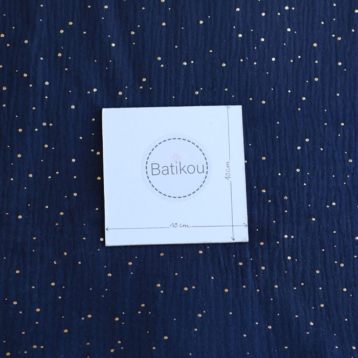 Double gaze de coton pois dorés fond bleu marine