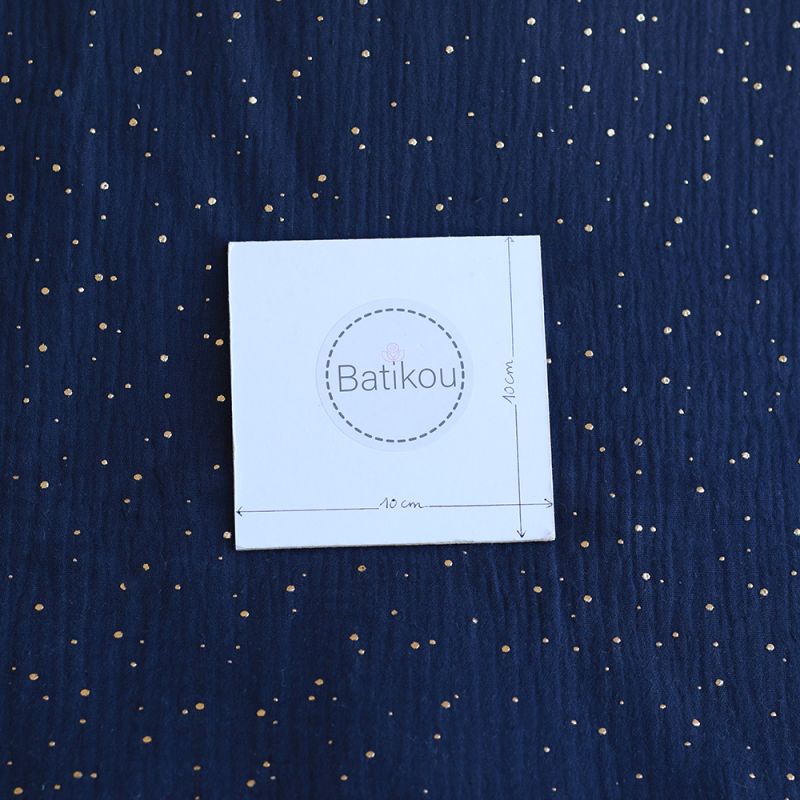 Double gaze de coton pois dorés fond bleu marine