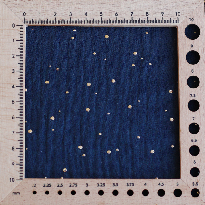 Double gaze de coton pois dorés fond bleu marine
