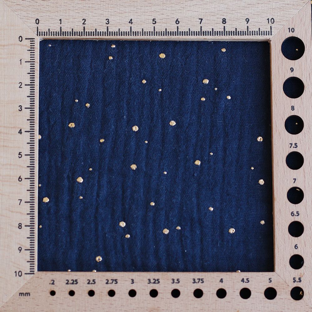 Double gaze de coton pois dorés fond bleu marine