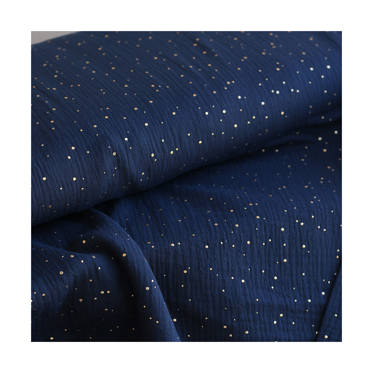 Double gaze de coton pois dorés fond bleu marine