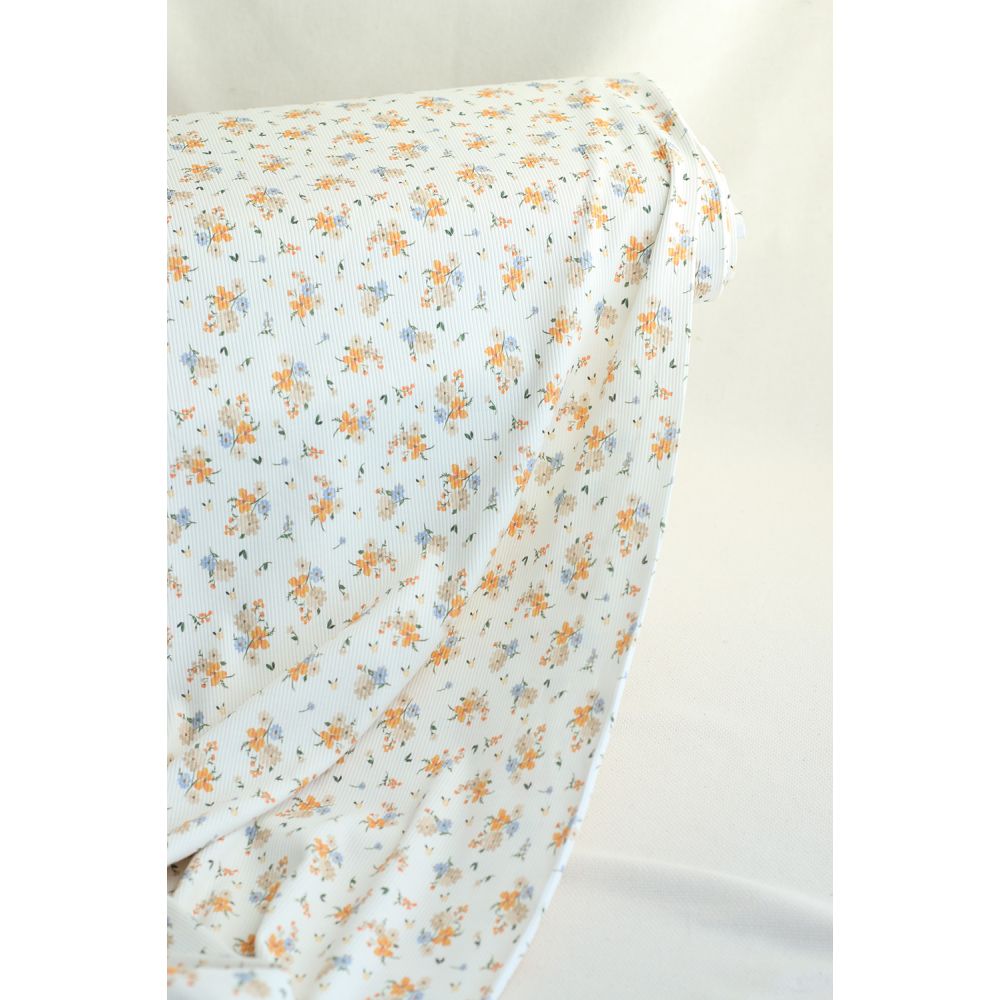 Jersey coton côtes fines à motif fleuri
