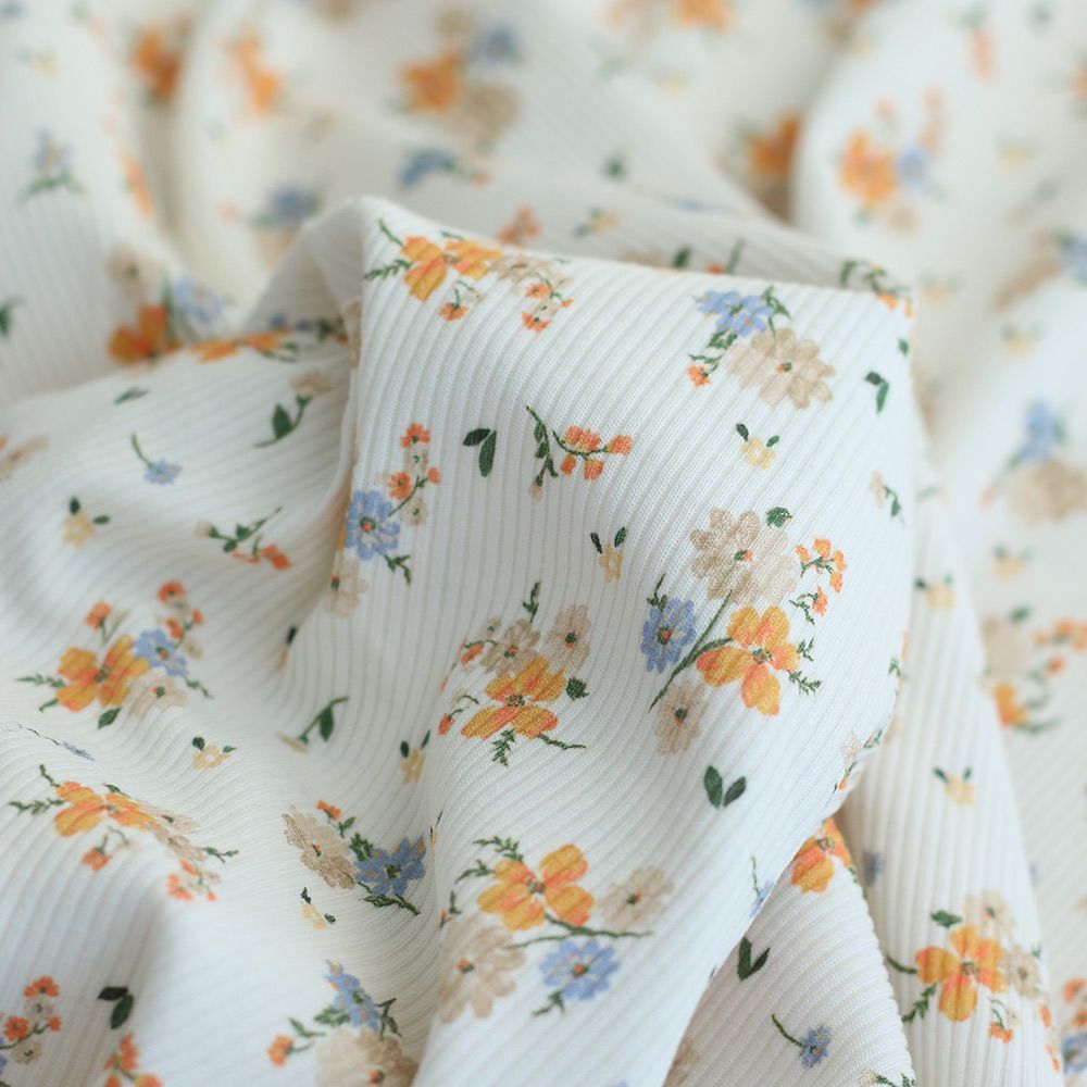 Jersey coton côtes fines à motif fleuri