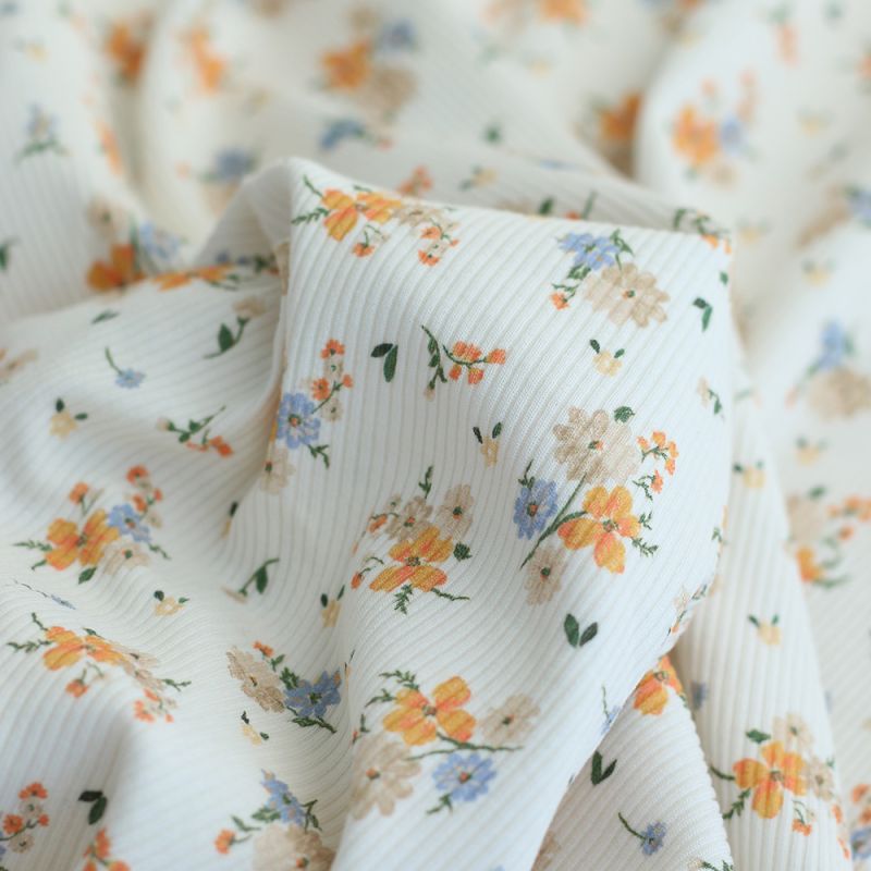 Jersey coton côtes fines à motif fleuri