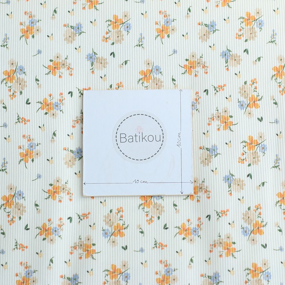 Jersey coton côtes fines à motif fleuri