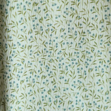 Jersey coton côtes fines à motif baies bleu et vert Jersey coton côtes fines à motif baies bleu et vert