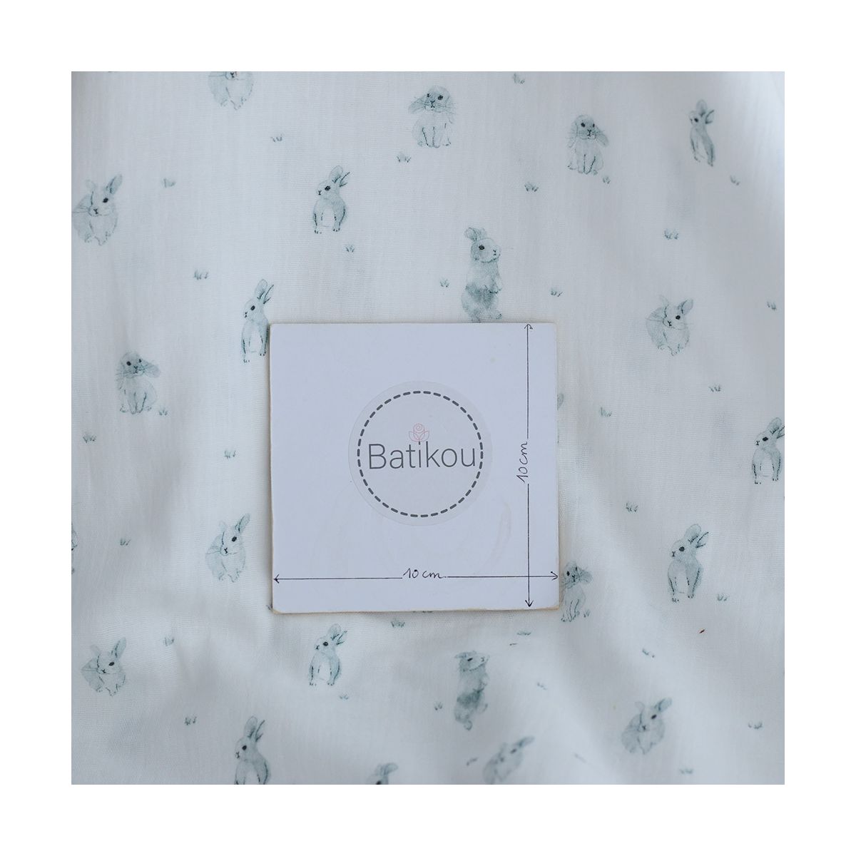 Pompon - Double gaze de coton BIO blanc motif lapins