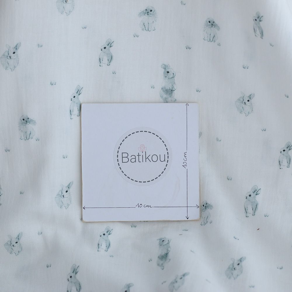 Pompon - Double gaze de coton BIO blanc motif lapins
