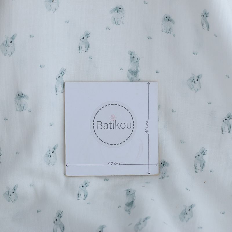 Pompon - Double gaze de coton BIO blanc motif lapins