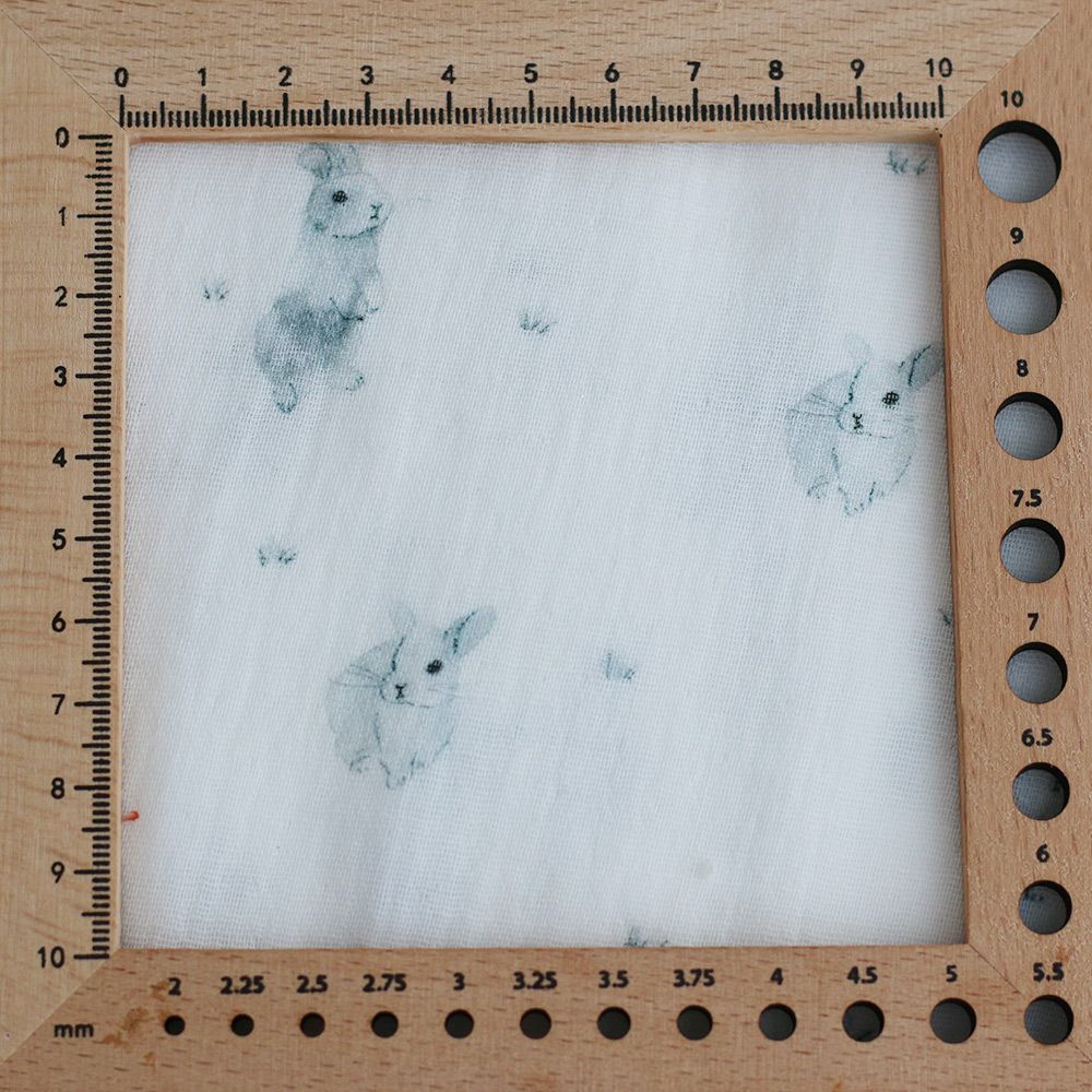 Pompon - Double gaze de coton BIO blanc motif lapins