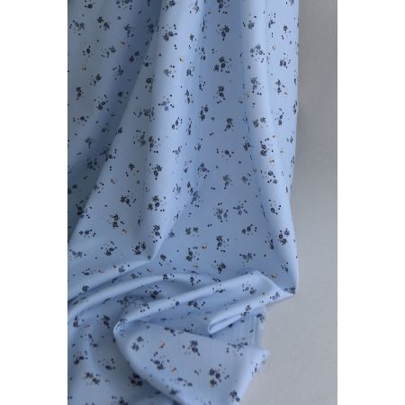 Paula - Tissu sergé de coton organique fin imprimé fond bleu ciel Paula - Tissu sergé de coton organique fin imprimé fond bleu ciel